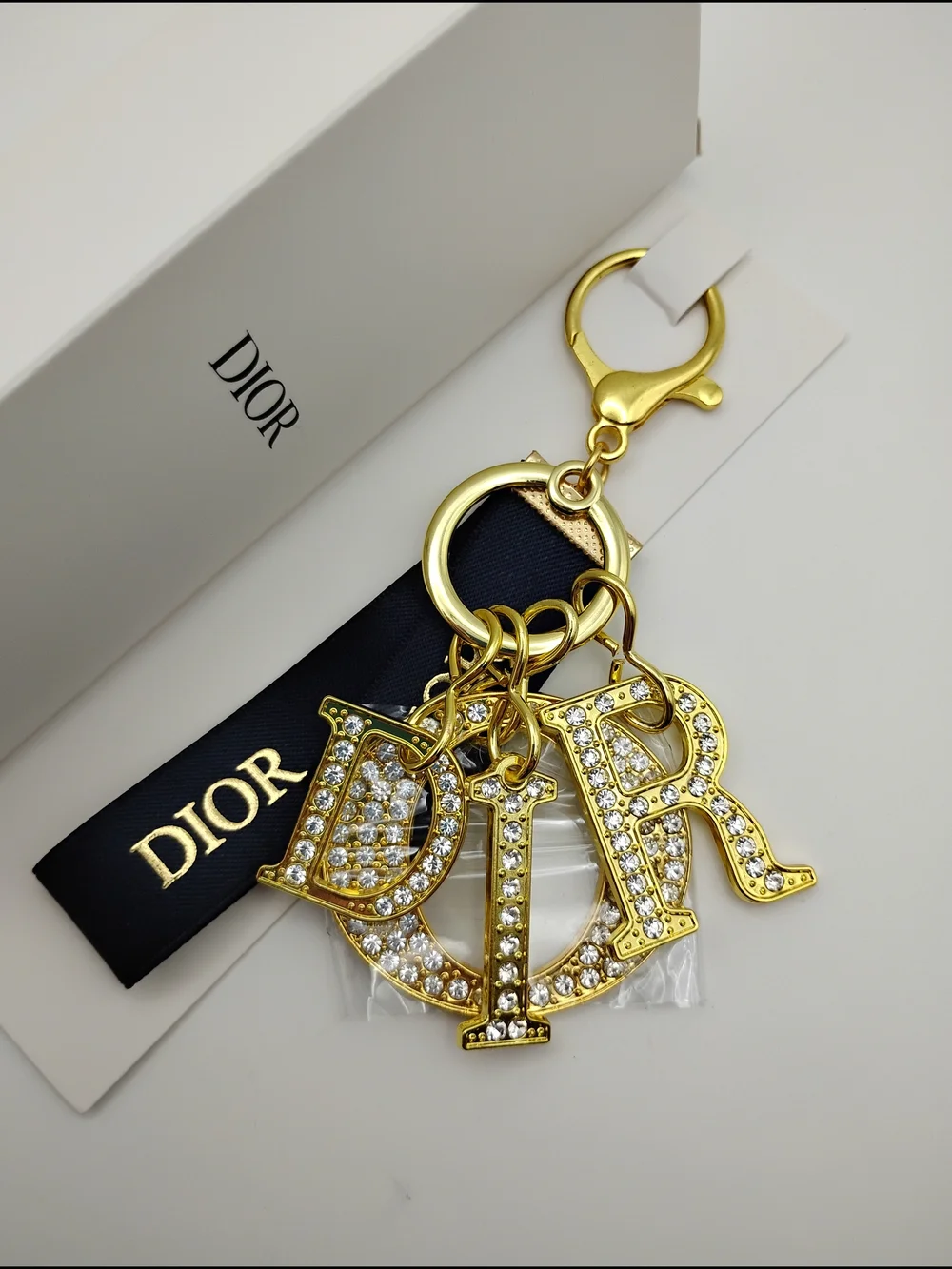 Dior Gold Crystal 'D I O R' Logo Keychain with Black Ribbon BNIB